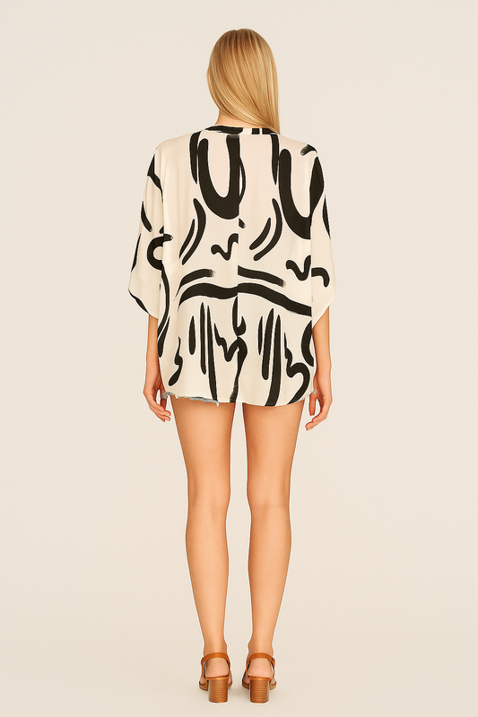 Geometric Print V-Neck Blouse – Batwing Sleeves, Relaxed Fit